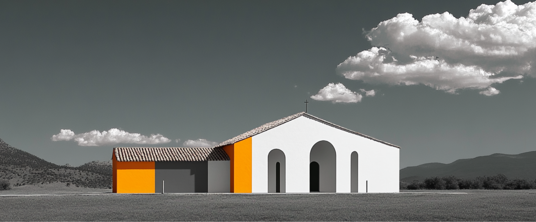 Church building with vibrant orange and gray accents, set against a mountainous landscape, symbolizing Multiply's mission to establish healthy, multiplying churches in under-resourced areas.