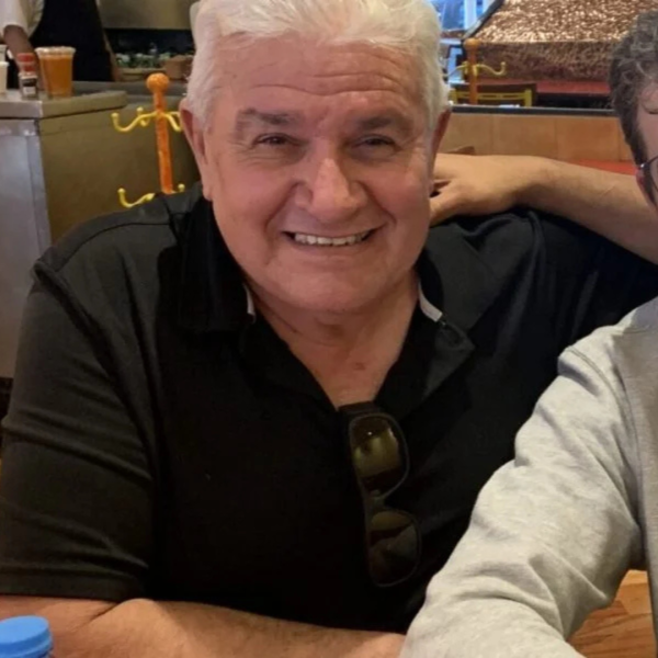 Portrait of older man smiling indoors