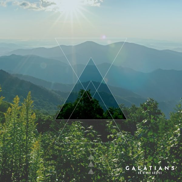 Mountain landscape with sun rays, symbolizing freedom in Christ, emphasizing grace over works, connected to the theme of Galatians.
