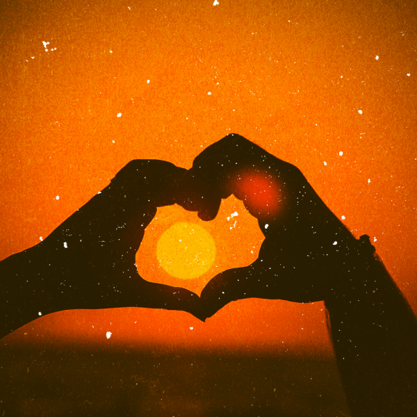 Hands forming a heart shape against a sunset, symbolizing love and trust in God's provision, reflecting themes of faith and stewardship.